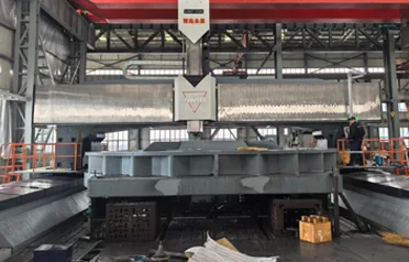 Hogyan könnyíthetik meg a nagyméretű CNC portálmarógépek a nehéz alkatrészek megmunkálását? A Tangshan Yuexin Machinery testreszabott berendezéseit sikeresen összeszerelték